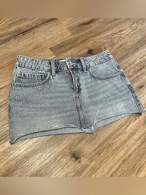 Light Wash Denim Mini Skirt with Star Studs